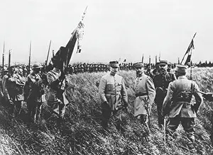 Humbert: General Petain decorating colours of Moroccan regiment