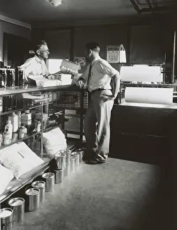 Necessities: General store shopkeeper and customer, Ohio, Aug