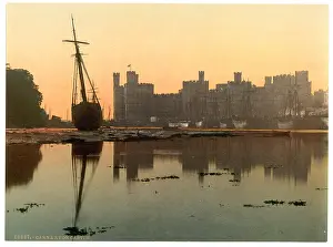 Caernarfon: General view, sunset, Carnarvon Castle (i.e. Caernarfon), Wa