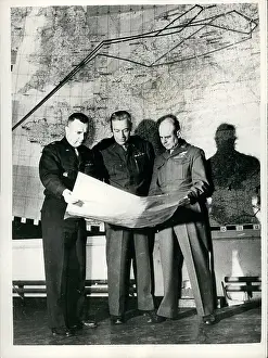 Doolittle: Generals Doolittle, Bawfill, Anderson, looking at a map