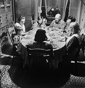 Montpelier: Three generations of a farm family at dinner in