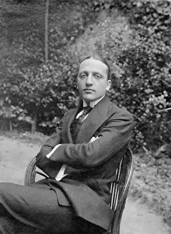 Vanessa Wagstaff: Gentleman sitting on a chair outside