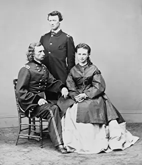 Bighorn: George Armstrong Custer, seated with his ?