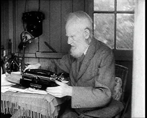 George Bernard Shaw Setting Up a Typewriter