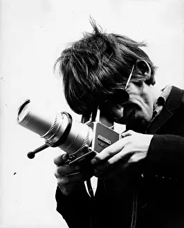 Grammy: George Harrison of The Beatles pop group with camera