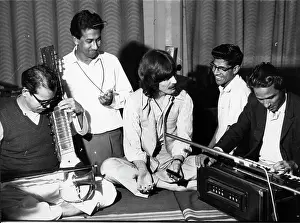 Demise: George Harrison with Indian musicians