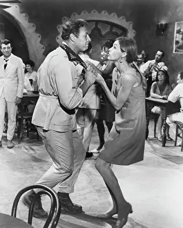 Renzi: George Kennedy - Eva Renzi