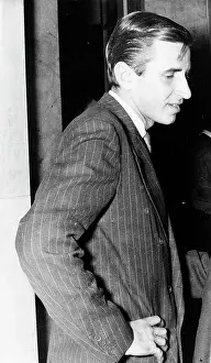 Livanos: George Livanos standing with his hands on hips