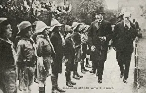 Respectful: George V inspecting boy scouts
