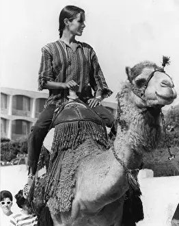 Audiard: Geraldine Chaplin, actress, riding a camel, Jerusalem