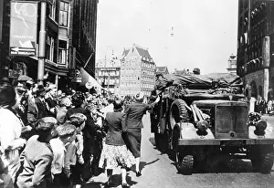Waved: German armed forces pull into Amsterdam, 1940