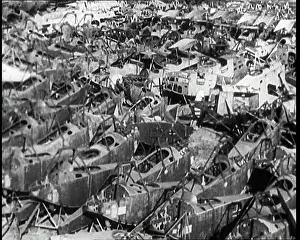 Piled: German Biplanes Piled High in a Scrapyard To