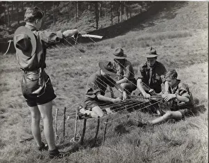 Strings: German boy scouts with camp loom