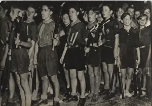 Torches: German boy scouts singing with torches