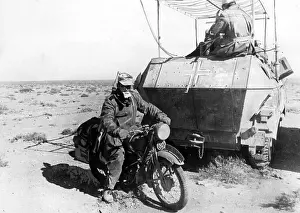 Dispatcher: German dispatch rider in desert, WW2