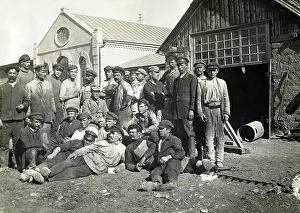 Earned: German engineer with his workers in a large