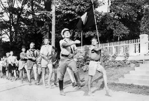 Principles: German ethnic boys of the camp Will and Power marching, 19