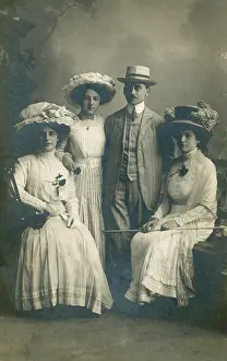 Pleated: German family group in studio portrait