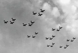 Reintroduction: German fighter panes performing a maneuver, 1935