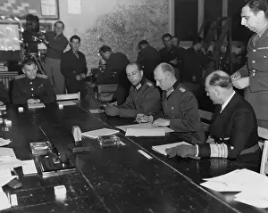 Unconditional: German General Gustaf Jodl, signs the unconditional