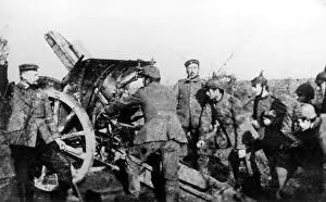 105mm: German gunners in action with 105mm howitzer, WW1