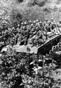 German Soviet: German infantrymen on an assault gun on the Eastern Front