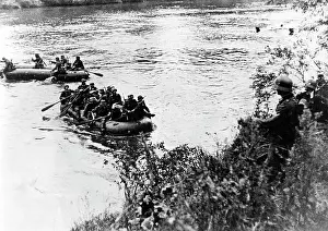 Inflatable: German infantrymen cross a river on the Eastern Front, 1941