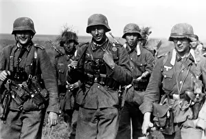 Flashlight: German infantrymen march at the southern sector of the