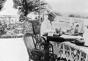 Purchased: German Kaiser Wilhelm II writes at his desk in the