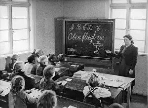Teaches: German lessons in a school, 1944