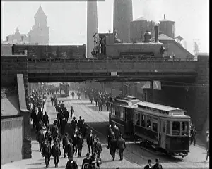 German Pedestrians and An Electric Tram Passing