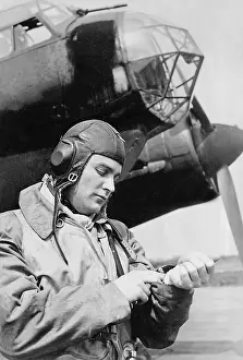 Consults: A German Pilot Next to a Junkers Ju 88 Plane, 1941