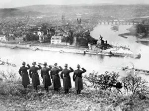 Saluting: German policemen salute in the direction of