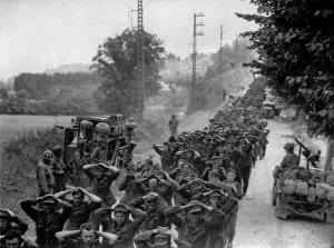 Retreated: German prisoners with U.S. guards on a Norman