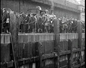 Queueing: German Prisoners Of War Queueing Dockside To