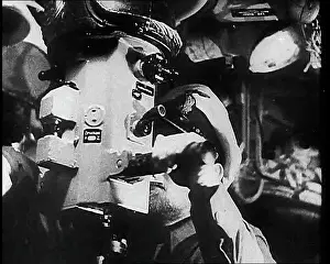 Periscope: A German Sailor Operating a U-Boat Periscope