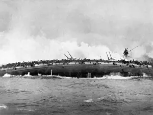 Capsized: German sailors cling to the capsized and sinking