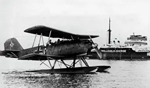 Neutral: German seaplane in front of a neutral cargo ship, 1940
