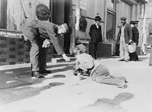 Beggar: German soldier with a beggar in Kharkov, 1918
