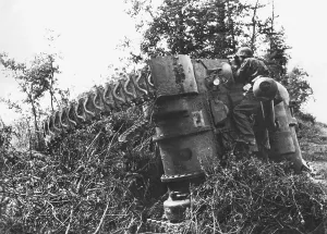 Caen: German soldier by a destroyed Sherman, 1944