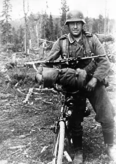 Submachine: German soldier at the front in Finland, 1943