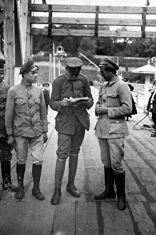 Echelon: German soldier inspects papers, 1918