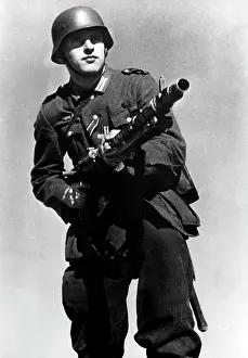 Predicted: A German soldier with a MG 34, 1941