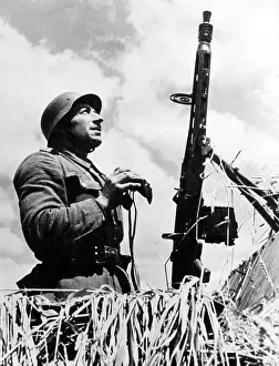Monitors: German Soldier with an MG 42, 1944