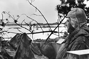Narva: German soldier at a post on the Narva, 1944