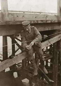 Charges: German soldier while preparing explosive charges on the West