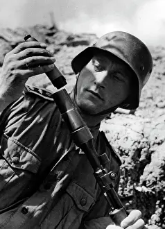 Carbine: German soldier with rifle grenade - Eastern Front, 1943