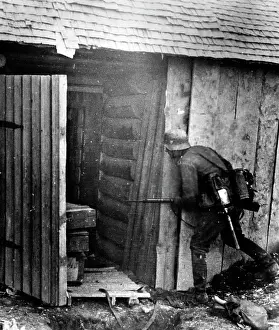 Approaches: German soldier at a Russian bunker, 1941