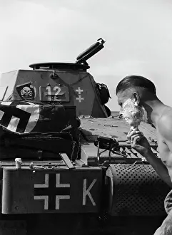 Shaving: German soldier shaving, 1941