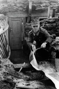 Bails: German soldier in front of a shelter on the Eastern Front